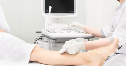 Female doctor ultrasound examination for patient